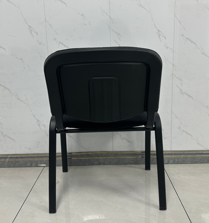 Armless Architectural Silhouette: Clean, space-saving profile allows unhindered movement and allows chairs to tuck neatly under any boardroom table. Contoured Ergonomic Support: Curved backrest supports natural spinal posture to keep attendees comfortable through long meetings and seminars. Plush Fabric Cushioning: Upholstered in high-density, wear-resistant black woven fabric designed for daily commercial use and easy maintenance. Heavy-Duty Steel Four-Leg Base: Powder-coated tubular steel frame provides exceptional load-bearing stability and long-lasting durability. Protective Floor Glides: Leg bases are fitted with non-marking glides to protect hardwood, tile, and commercial carpet from scuffs and scratches.